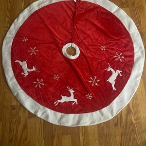 Red and White Holiday Tree Skirt with Reindeer and Snowflakes